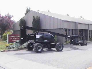 Jlg 600a Dual Fuel Boom Lift Man Lift - All Black - photo