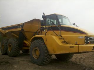Caterpillar 740 Articulated Truck With Tailgate photo