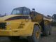 Caterpillar 740 Articulated Truck With Tailgate Crawler Dozers & Loaders photo 1