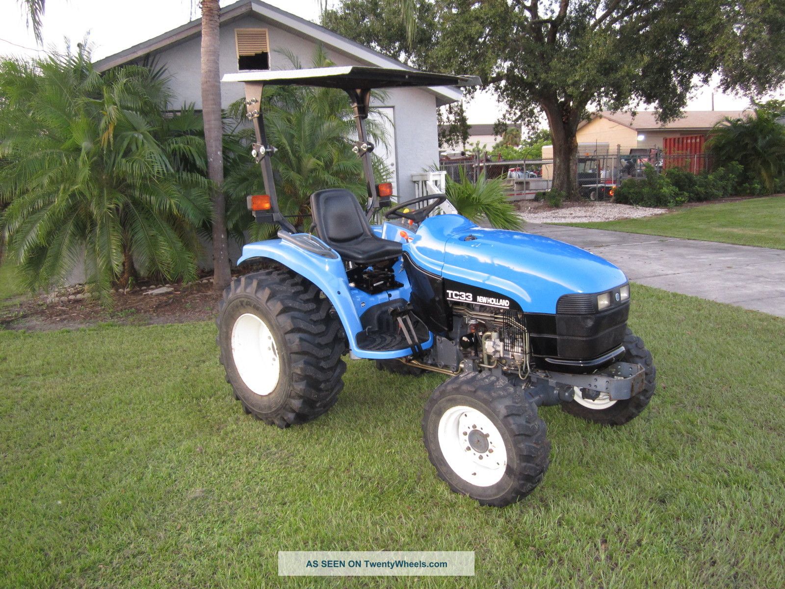 New Holland Tc 33 Diesel Compact Tractor 4 Wheel Drive R3 Tires 558 Hrs Tractors photo