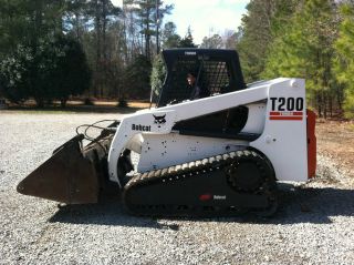 2002 Bobcat T200 Skid Steer Loader With 4 - In - 1 Bucket & photo