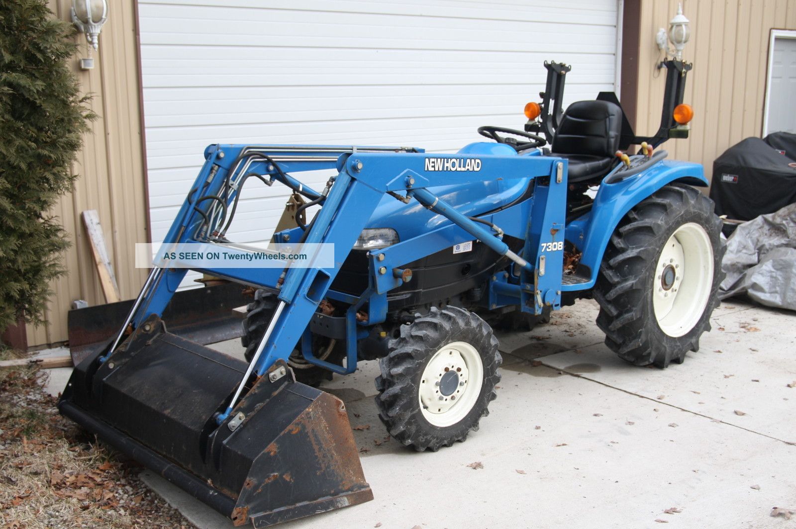 New Holland 1630 With Loader,  4x4,  Hydro,  Quick Steer,  Diesel,  416 Hours Tractors photo