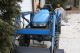 New Holland 1630 With Loader,  4x4,  Hydro,  Quick Steer,  Diesel,  416 Hours Tractors photo 1