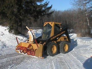 Holland 555 Deluxe 1940hrs.  With Factory Cab And Snowblower photo