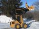 Holland 555 Deluxe 1940hrs.  With Factory Cab And Snowblower Skid Steer Loaders photo 1