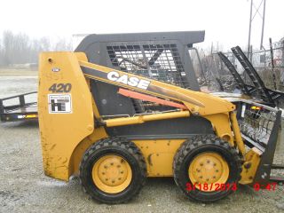 Case 420 Skid Steer Low Hrs With Attachments photo