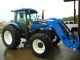 2009 Holland Td95d Cab 4x4 Tractor With 820 Holland Front Loader Tractors photo 1