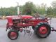 International Farmall 140 Tractor W/cultivators Tractors photo 1