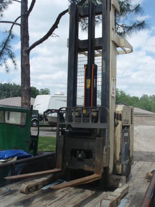 Crown Fork Lift Reach Truck With Side Shuttle,  Tilt,  And Triple Masts photo