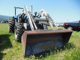 Long Tractor Model 2610dtc With Front End Loader photo