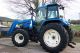 Holland Ts100 Mfwd Tractor With 7511 Loader Tractors photo 10