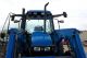Holland Ts100 Mfwd Tractor With 7511 Loader Tractors photo 2