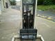 Crown 20mt - 110 2000lb Capacity Electric Forklift With Charger,  Straddle Lift Forklifts photo 1