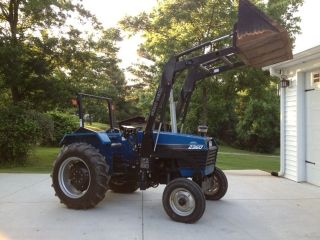 Long 2360 Tractor With Front Loader Diesel photo
