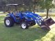Holland 4x4 Loader Tractor / Finish Mower Tractors photo 9