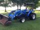 Holland 4x4 Loader Tractor / Finish Mower Tractors photo 10