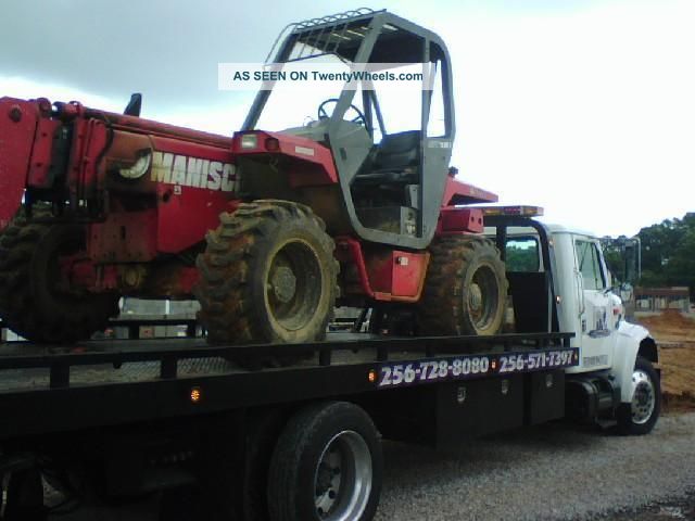2000 International 4900 Flatbeds & Rollbacks photo