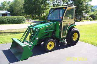 John Deere Compact Tractor 4210 4x4 With Loader And Cab And 59 Inch Snowblower photo