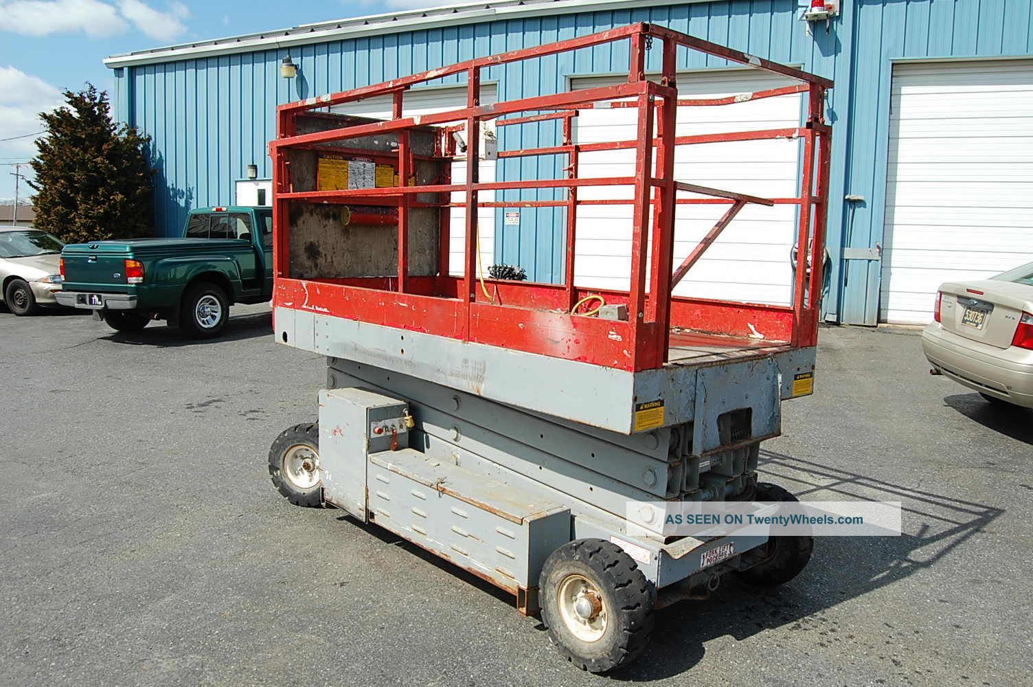 Mec Scissor Lift Model 2548ht 24ft 9in I1006 Forklifts photo