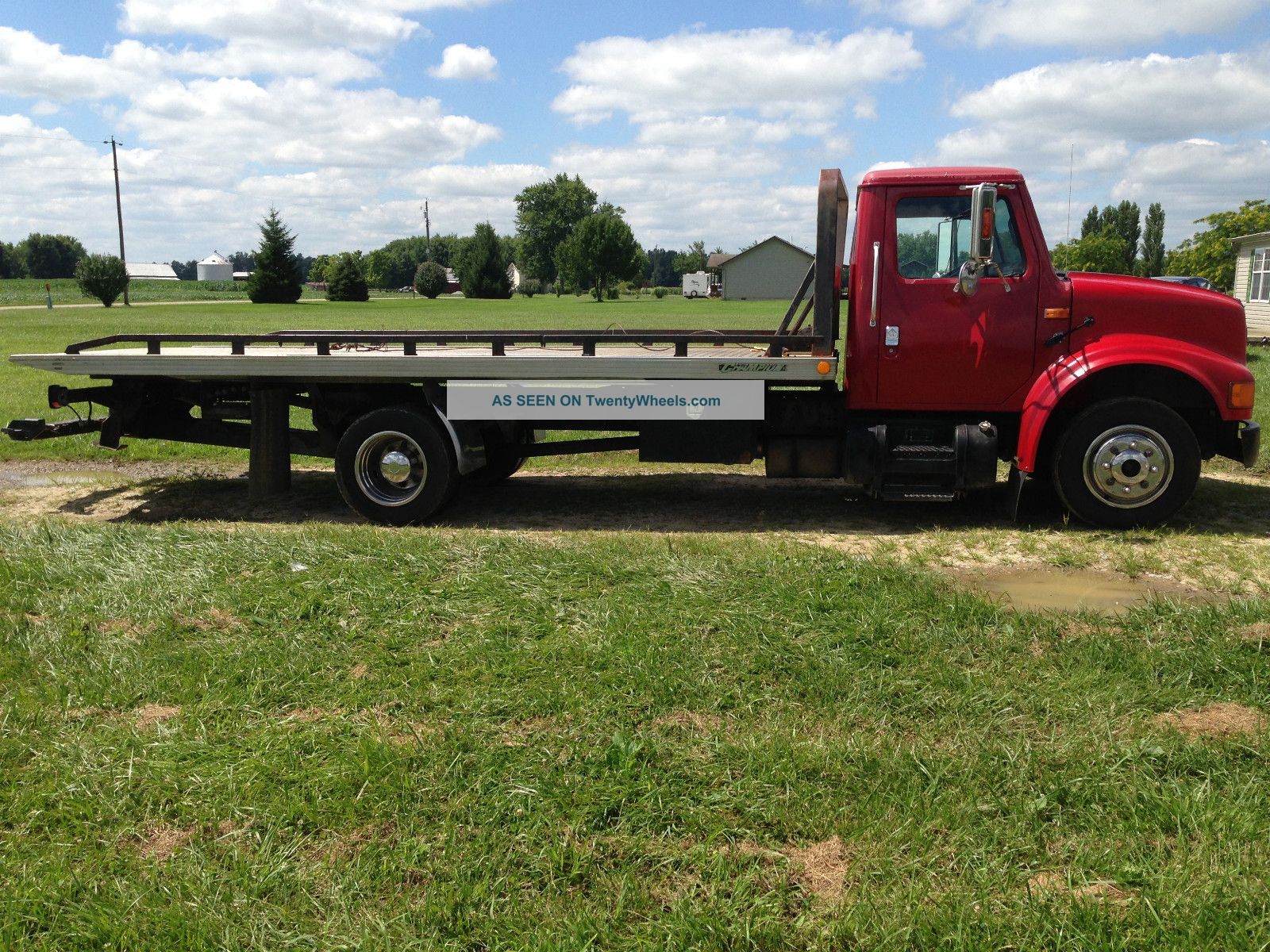 1997 International 4700 Rollback Flatbeds & Rollbacks photo