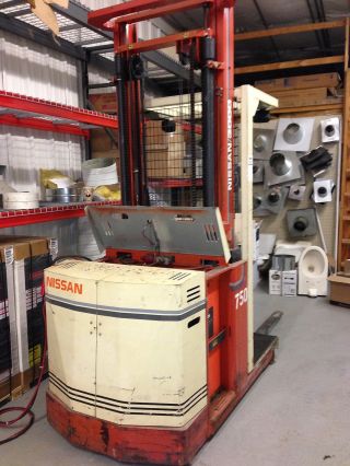 Nissan 3000 Forklift With Battery Charger photo