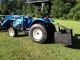 Holland Tc55da 4wd Loader Tractor/ Attachments Tractors photo 2