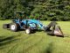 Holland Tc55da 4wd Loader Tractor/ Attachments Tractors photo 3