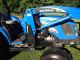 Holland Tc55da 4wd Loader Tractor/ Attachments Tractors photo 7