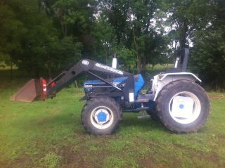 Ford 6640 85 Hp 4x4 Tractor And Loader - Shuttle Shift photo