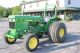John Deere 1050 Tractor W/9 ' Sickle Bar Mower Tractors photo 1