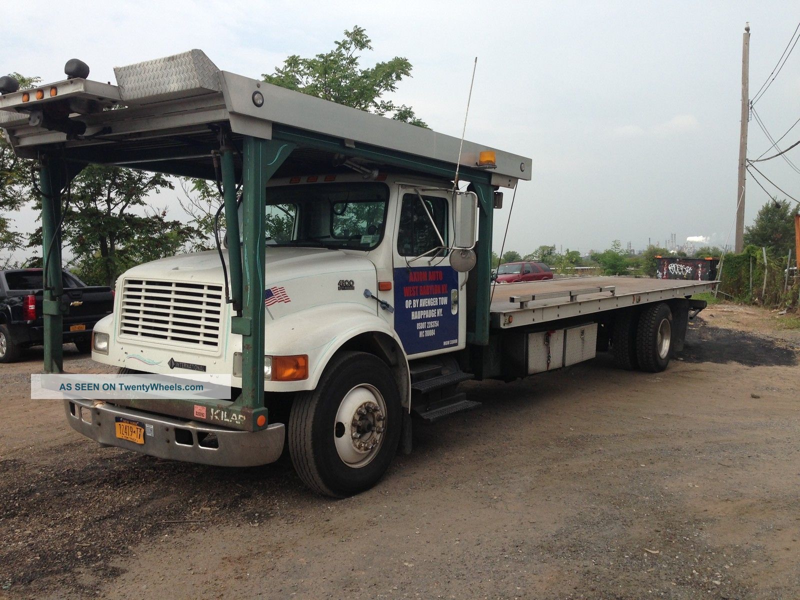 2000 International 4900 Flatbeds & Rollbacks photo