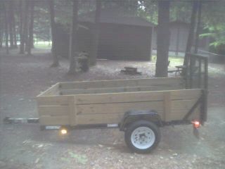 2012 4 ' X 8 ' Carry - On Wood - Sided Utility Trailer photo