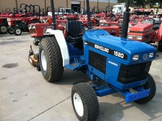 Ford - Holland 1520 Hydrostactic With 5 ' Finish Mower And Turf Tires. photo