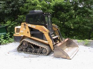 Asv Rc 50 With Backhoe,  Bucket,  And Forks photo