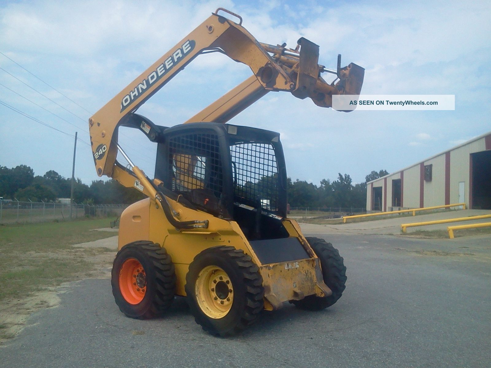 John Deere Skid Steer Loader Backhoe Loaders photo