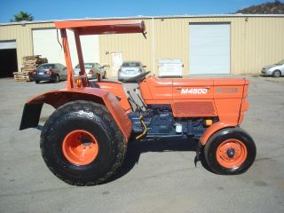 Kubota M4500 Tractor 2300 Hours 55 Hp,  Pto 49 Hp,  4 Speed Hi/low Runs Excellent photo
