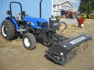 Holland Tn60a Tractor,  16x16 Power Shuttle,  7 ' Sweepster Broom, photo