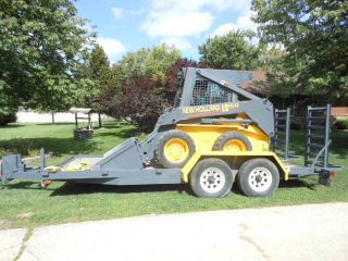 Bobcat Skid Steer Newholand 590 Hours Stored Inside Since photo