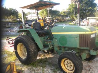 John Deere 870 Farm Tractor With Bush Hog photo
