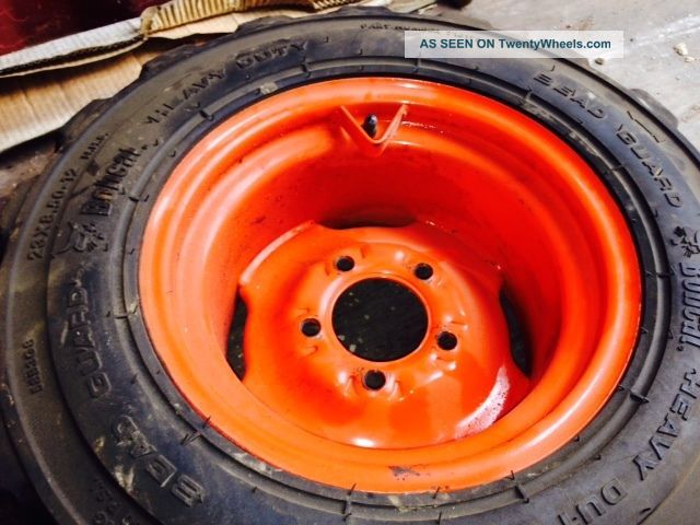 (4) 463 Bobcat Tires And Rims Skid Steer Loaders photo