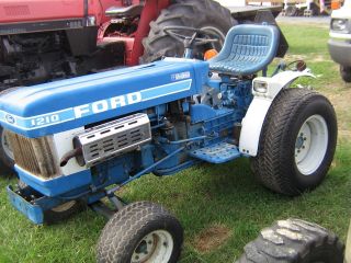 Ford 1210 W/ Belly Mower photo