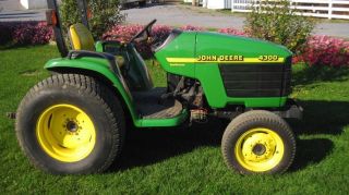 2000 John Deere 4300 Compact Tractor.  Only 830 Hrs.  Condition Loader Valve photo