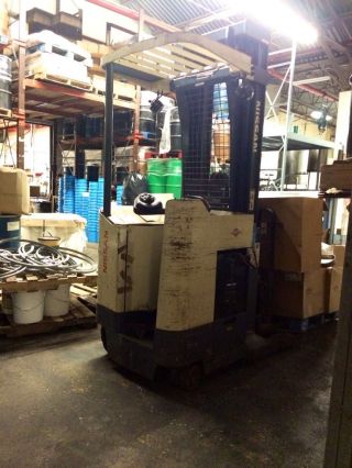 Nissan Rrn35 Stand On Reach Electric Forklift photo
