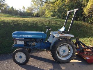 1984 Ford 1510 Tractor With Attachments photo