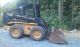 Holland Lx665 Skid Steer With Bucket & Backhoe Attachment Skid Steer Loaders photo 1