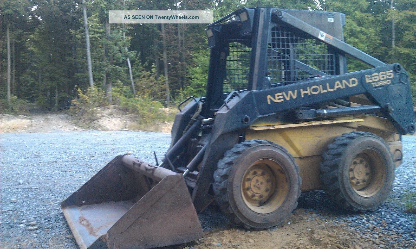 Holland Lx665 Skid Steer With Bucket & Backhoe Attachment