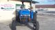 Holland Tn65 Diesel Tractor,  Turf Tires,  Sun Roof Tractors photo 1
