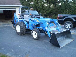 2012 Holland Compact Tractor Loader Backhoe Only 56 Hours photo