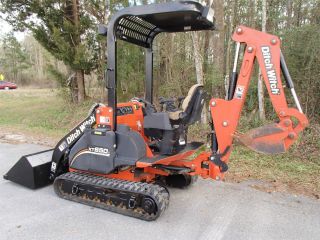 Ditch Witch Xt850 Mini Excavator & Tool Carrier Skid Steer Plus Ten Attachments photo