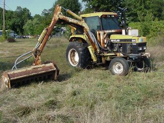2001 Holland 6640 Tractor With Flail Mower photo